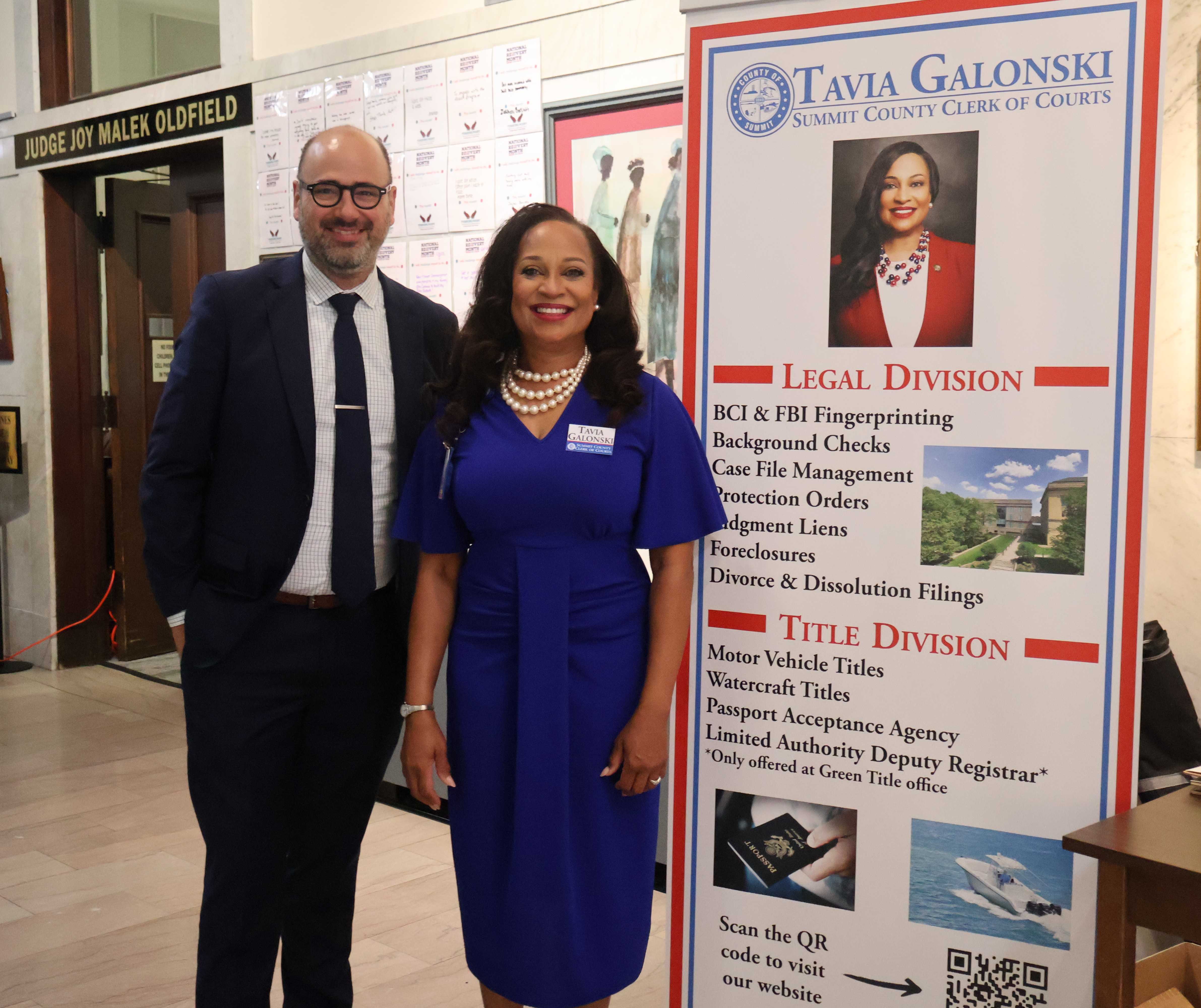 Summit County Prosecutor Elliot Kolkovich and Summit County Clerk of Courts Tavia Galonski pose in courthouse